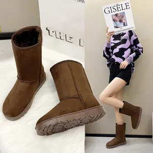 Classic brown winter snow boots with warm fur lining and stylish suede finish