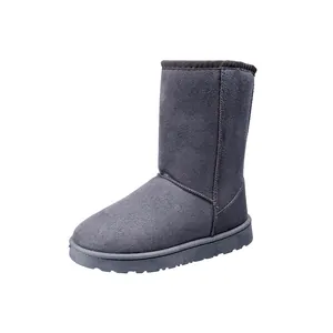 Detailed side view of grey mid-calf snow boots featuring a thick sole and warm plush lining.