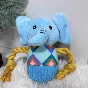 Close-up of a blue elephant plush dog toy featuring durable yellow cotton rope arms