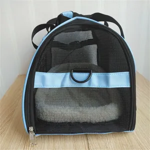 Detail showing breathable black mesh and sturdy D-ring on a blue pet carrier bag