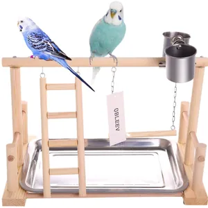 Wooden bird playground stand with ladder, swing, and feeding cups for parrots