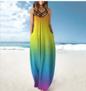 Close-up detail of vibrant colorful gradient summer maxi dress with criss-cross neckline