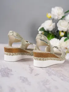 Detailed rear view of stylish women's wedge sandals with woven hemp rope platform details