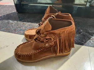 Casual women's brown suede fringe ankle boots with bohemian lace-up detail and thick sole