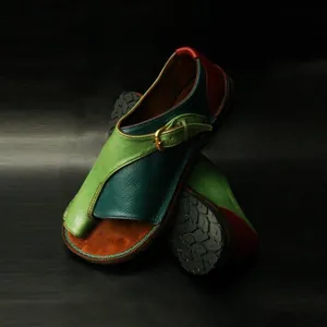 Detailed view of vintage bohemian color-block flat sandals with premium leather texture.