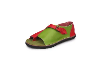 Detail showing colorful red and green leather flat sandals with toe-ring design