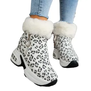 Leopard print women's snow boots featuring white faux fur lining and thick platform sole