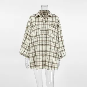 Full front view of vintage oversized plaid shirt on a transparent mannequin.