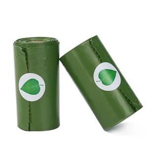 Dos rollos de bolsas biodegradables verdes para excrementos de mascotas con icono de hoja