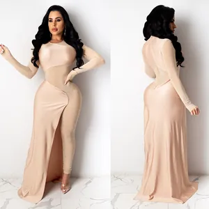 Elegante body in strass champagne con pannelli trasparenti e sovrapposizione gonna asimmetrica