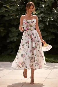 Elegant white chiffon midi dress featuring pink floral prints and thin spaghetti straps