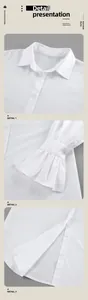 Detailed close-up of white cotton shirt collar, ruffled cuffs and split hem design