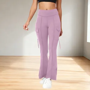 High-waisted pink flared yoga pants with cargo side pockets and decorative straps.