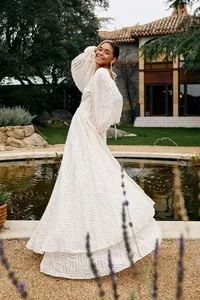 Elegant white jacquard pleated long dress with puffy lantern sleeves and full skirt