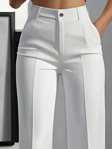 Close-up detail of women's elegant white high-waisted drape straight suit trousers