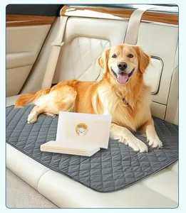 Detail of thickened dog poop bags and quilted car seat protector with Golden Retriever