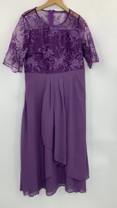 Detail of purple evening dress featuring floral lace bodice and pleated chiffon skirt