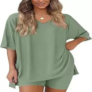 Women's casual green lounge set featuring a loose V-neck T-shirt and matching elastic shorts