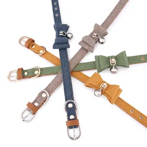 Felt bowtie pet collar with bell for cats and dogs in multiple colors.
