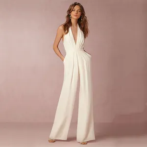 Elegant white sleeveless halter neck wide leg jumpsuit with a deep V-neck style