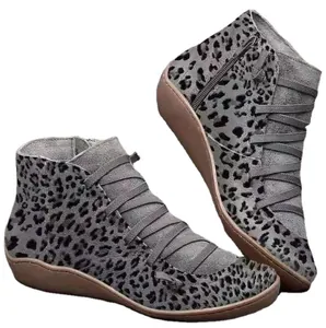Stylish grey leopard print ankle boots with side zipper and flat brown rubber sole