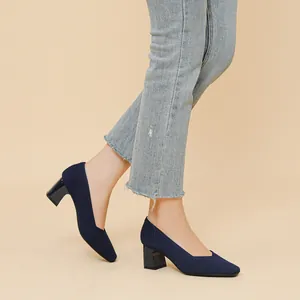 Elegant navy blue ribbed knit chunky heel pumps featuring square toe and stylish V-neck opening