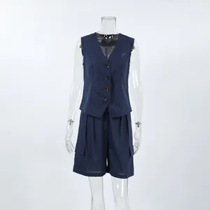 Full front detail of a navy blue cotton linen sleeveless vest and matching cargo shorts set