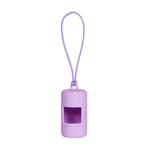 Detail view of a purple silicone dog waste bag dispenser with matching lanyard