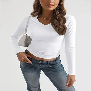 Close-up of a women's slim-fit white V-neck long sleeve T-shirt for autumn style