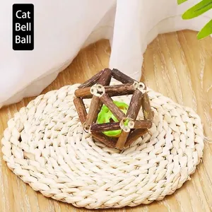 Natural silvervine stick ball cat toy with green internal bell for dental cleaning