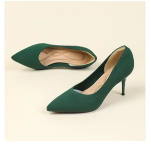 Detailed side view of dark green pointed-toe knitted stiletto pumps with comfort insoles
