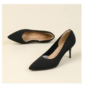 Elegant black pointed-toe knitted high heel stiletto pumps shown on a neutral background.
