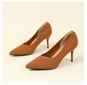 Close-up view of elegant brown pointed-toe knit stiletto pumps featuring a 7.5cm heel