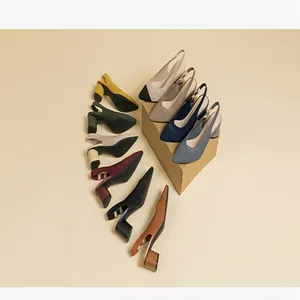Detailed view of multi-color knit pointed-toe slingback sandals with comfortable block heels.