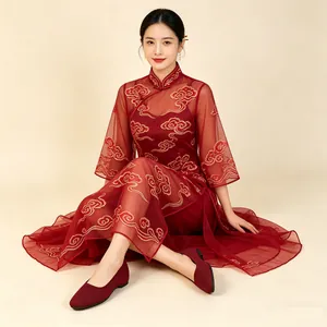 Elegant red knitted square-toe flats with hidden heel, worn with a traditional cheongsam.