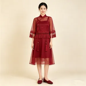 Close-up styling of wine red knitted square toe flats paired with a modern Cheongsam.