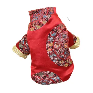 Traditional red Chinese Tang suit for dogs and cats, perfect for Lunar New Year celebration.