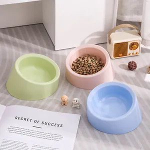 Tilted neck-protection pet bowls in pastel colors, ideal for cats and small dogs
