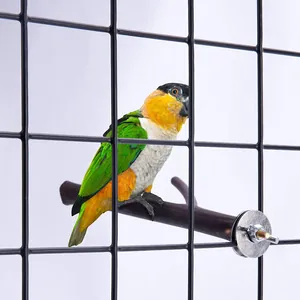 Close-up of a natural wooden bird perch branch with screw attachment for cages