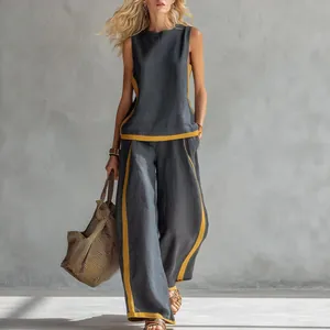 Set due pezzi estivo con top smanicato e pantaloni a gamba larga in grigio e giallo