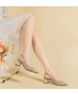 Detailed view of elegant beige knit pointed-toe slingback sandals with block heel