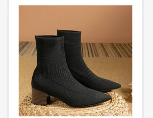 Elegantes botines de calcetín de punto negro con tacón grueso texturizado mujer