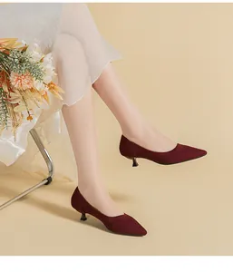 Close-up detail of wine red breathable knitted pointed-toe kitten heel pumps for women