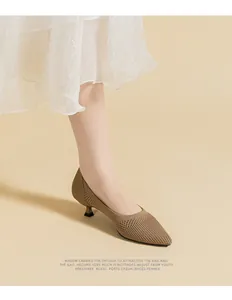 Macro view showing the breathable knitted mesh texture on these pointed-toe kitten heels.