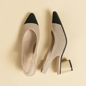 Elegant beige knit slingback sandals featuring black pointed toe and block heels