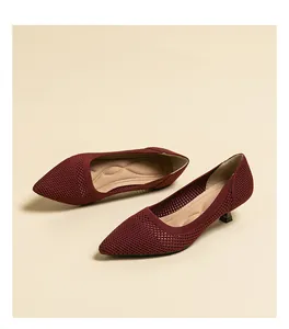 Close-up of wine red breathable knit pointed-toe kitten heel pumps for women