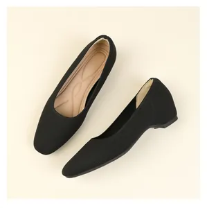 Top-down detail of breathable black knit square-toe ballet flats for women's office wear
