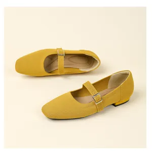 Detailed view of yellow breathable knitted Mary Jane shoes with adjustable buckle strap