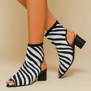 Stylish zebra-striped knit peep-toe chunky heel ankle boots for women shown in detail