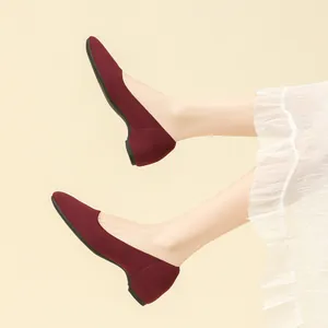 Elegant wine red knit square toe wedge ballet flats shown on model with skirt